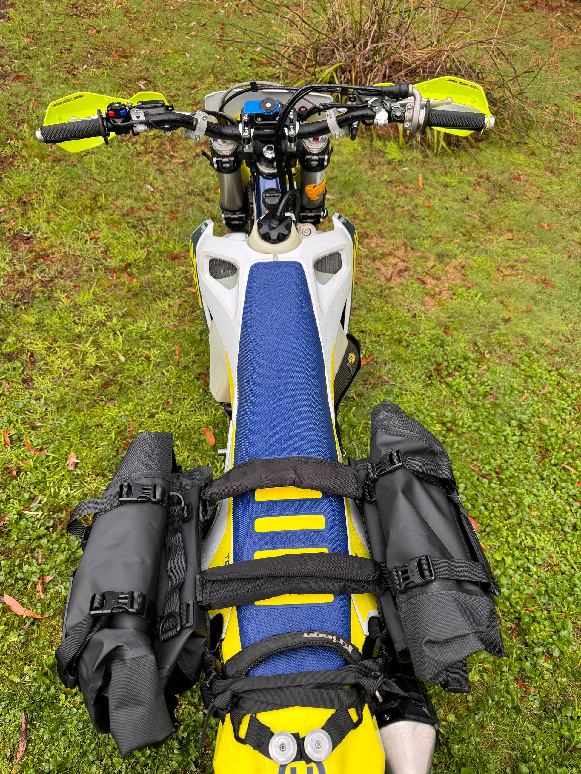 Large size RhinoWalk pannier bags fixed to an adventure motorcycle, viewed from above. 