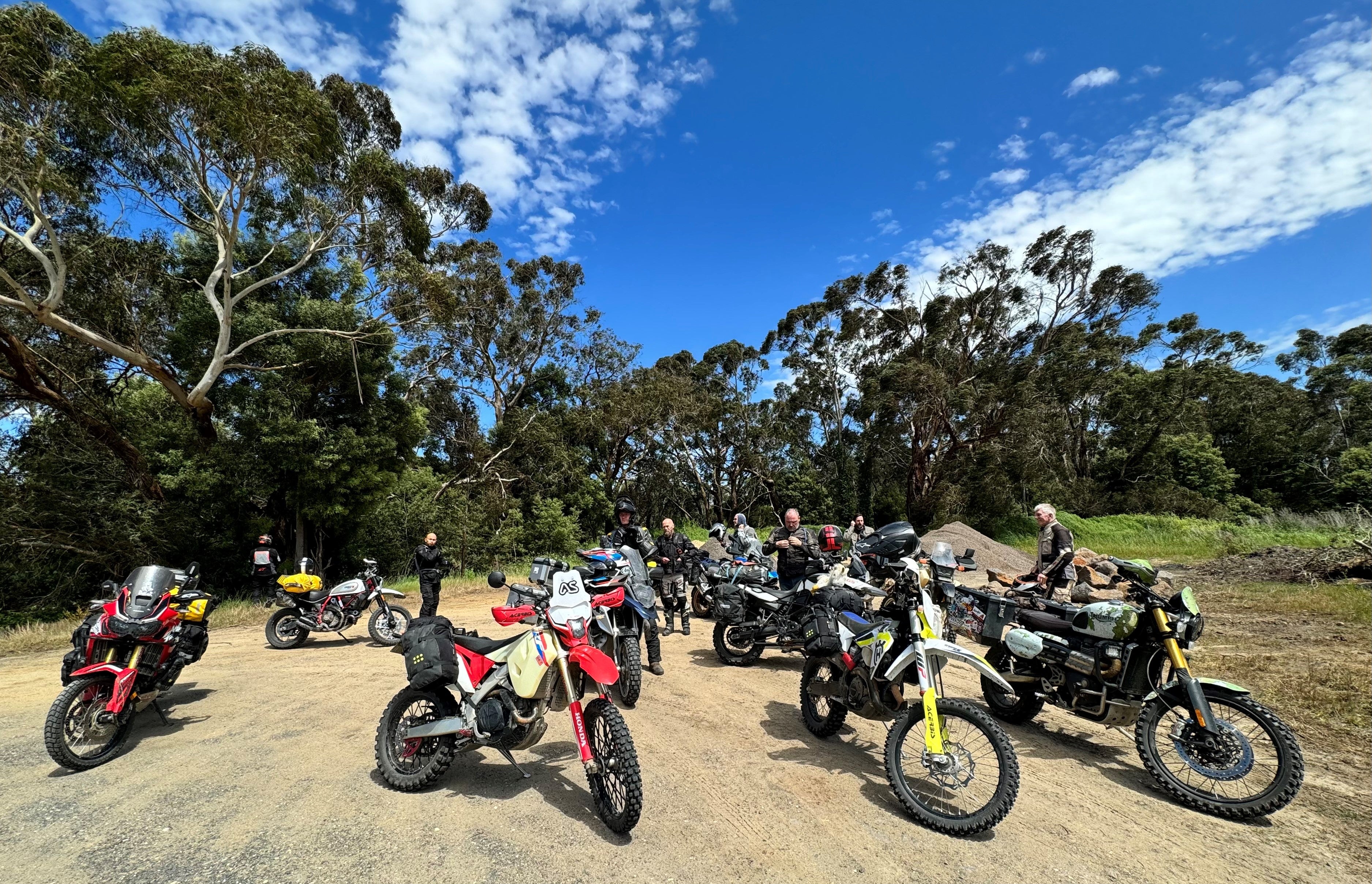 Group of adventure bike riders in the Victorian Otway Ranges taking a break